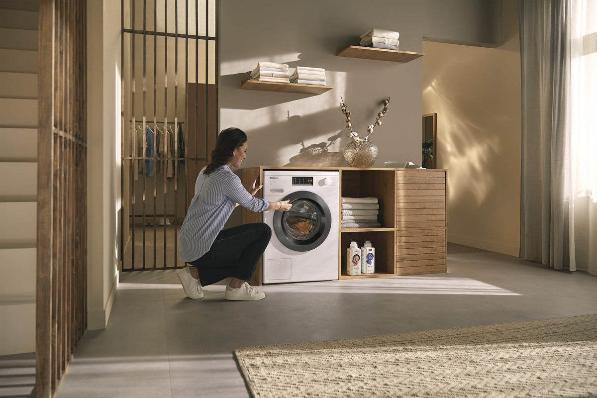 Miele W1 Active WEA125 WCS 8kg 1400rpm Washing Machine - Lotus White - loading the machine