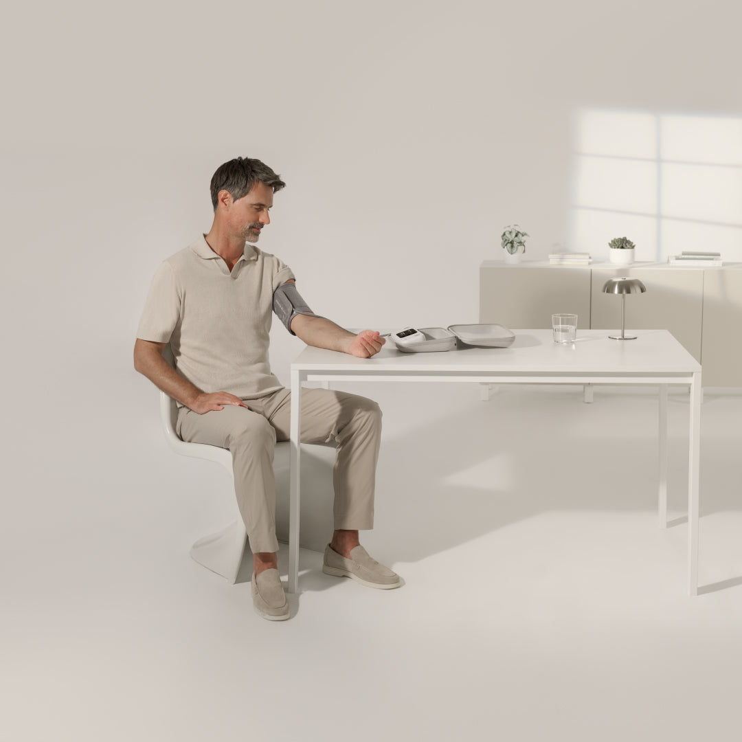 Withings BPM Vision Wi-Fi Upper Arm Blood Pressure Monitor - in use, seated