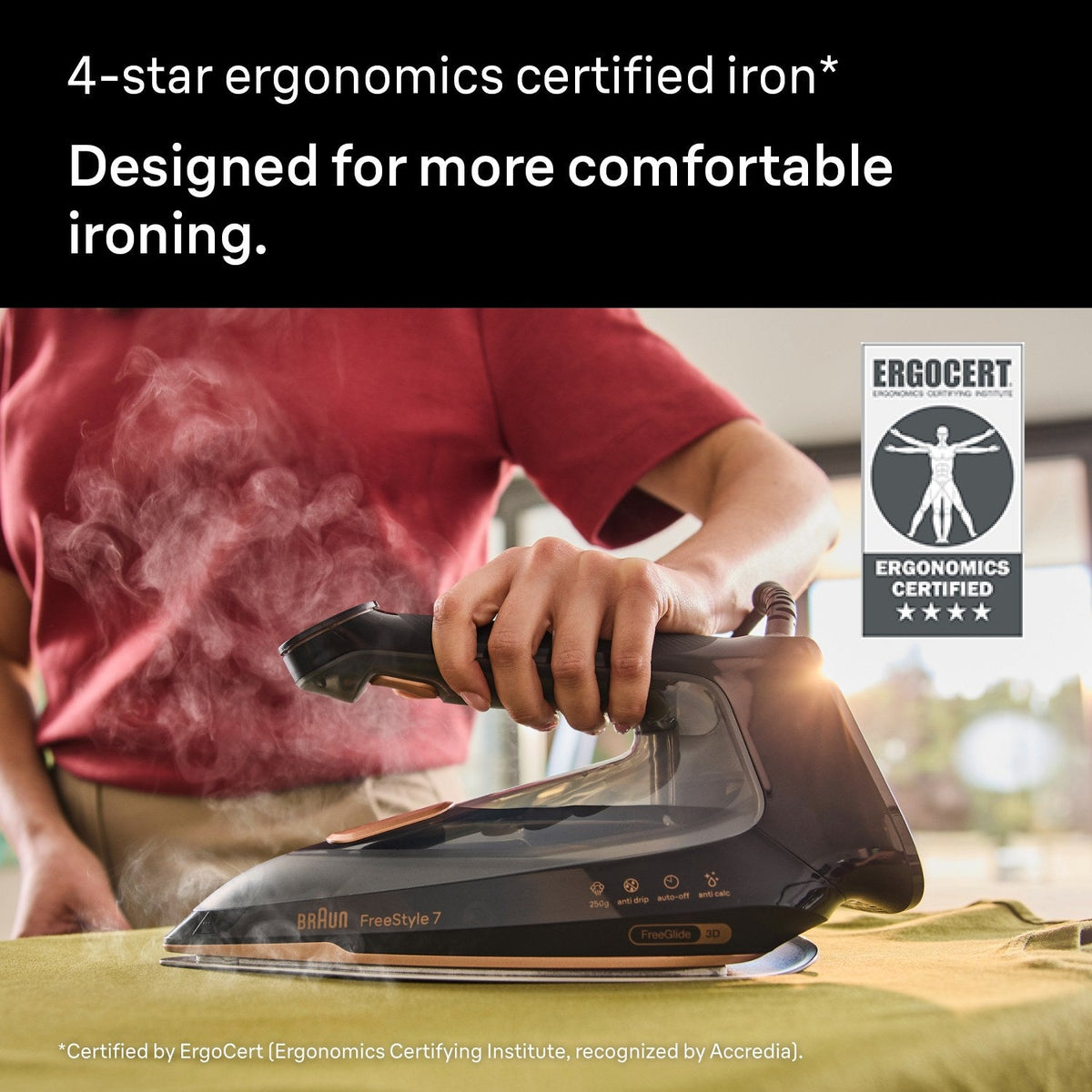 Braun FreeStyle 7 Steam Iron - Black - ergonomic handle in use