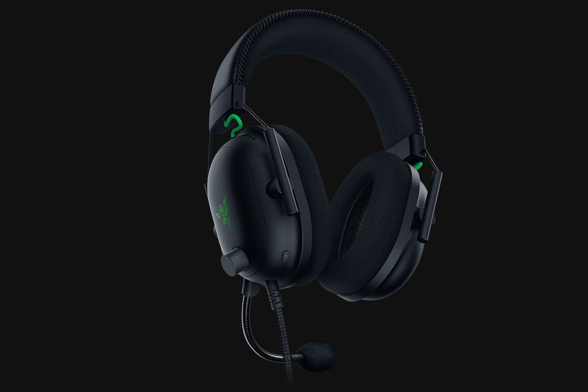 Razer BlackShark V2 Wired Esports Headset with USB Sound Card - Black - angled view, studio