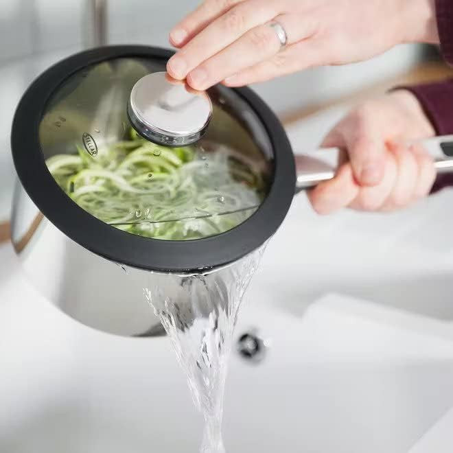 Stellar Stay Cool 4 Piece Draining Saucepan Set SLB2 lifestyle draining-lid action shot