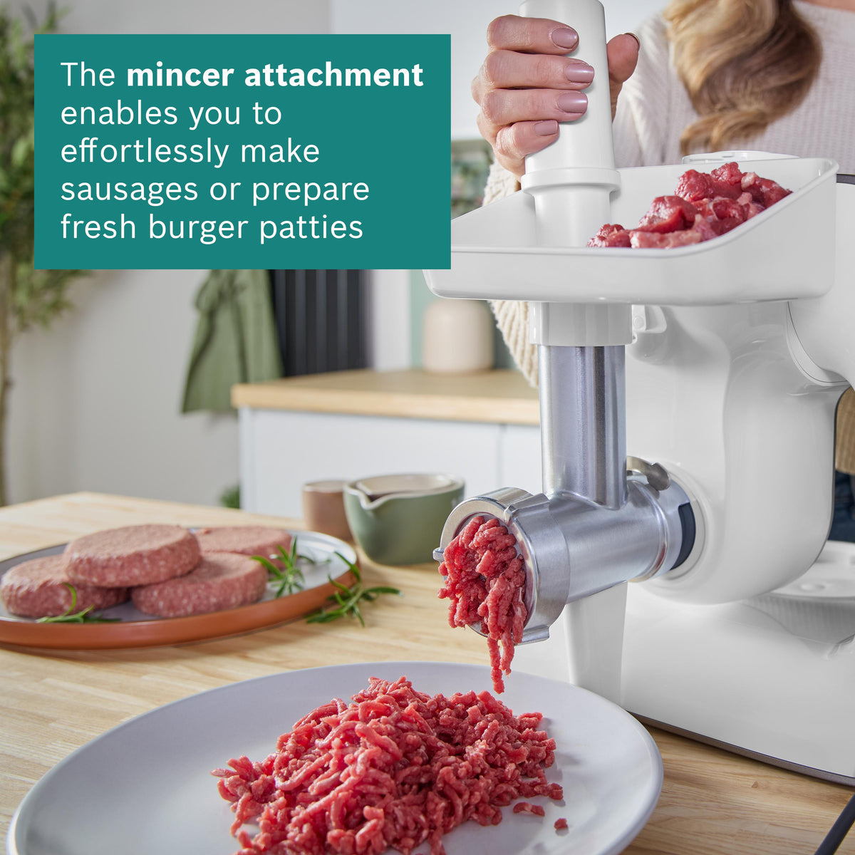 Bosch Series 4 MUM5 Stand Mixer with Integrated Scales 1000W - White - mincer attachment in use