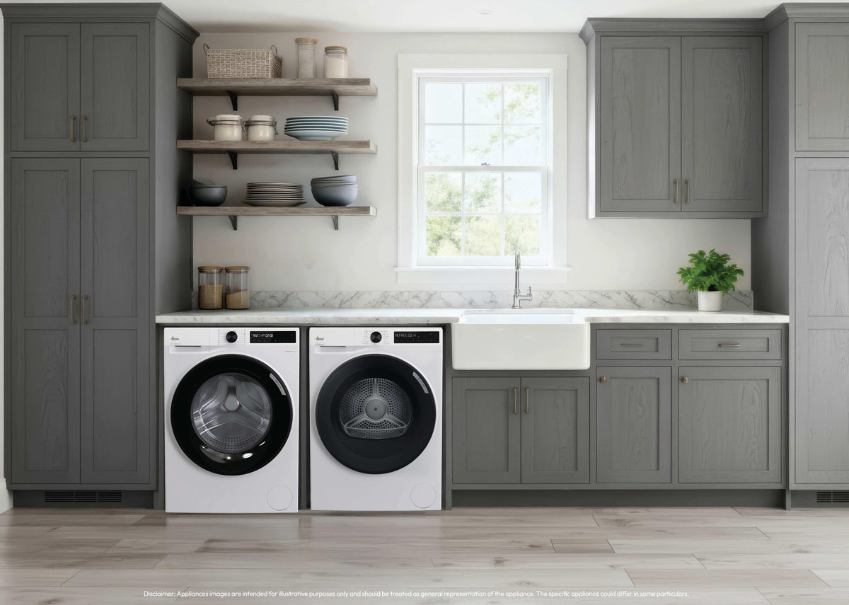 Hoover Pro Dry Series 3 9kg Heat Pump Tumble Dryer - White - with the matching washer in a utility room