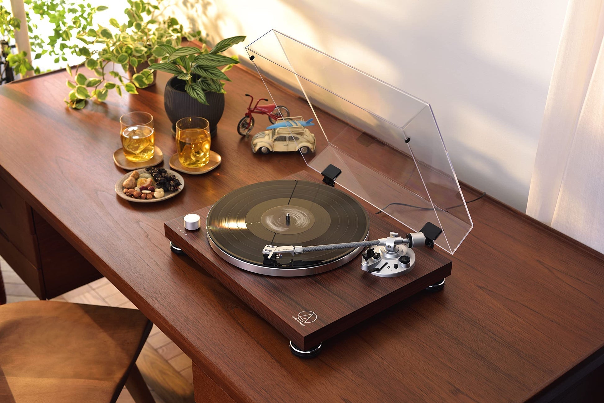 Audio-Technica AT-LPW50BT-RW rosewood turntable lifestyle view