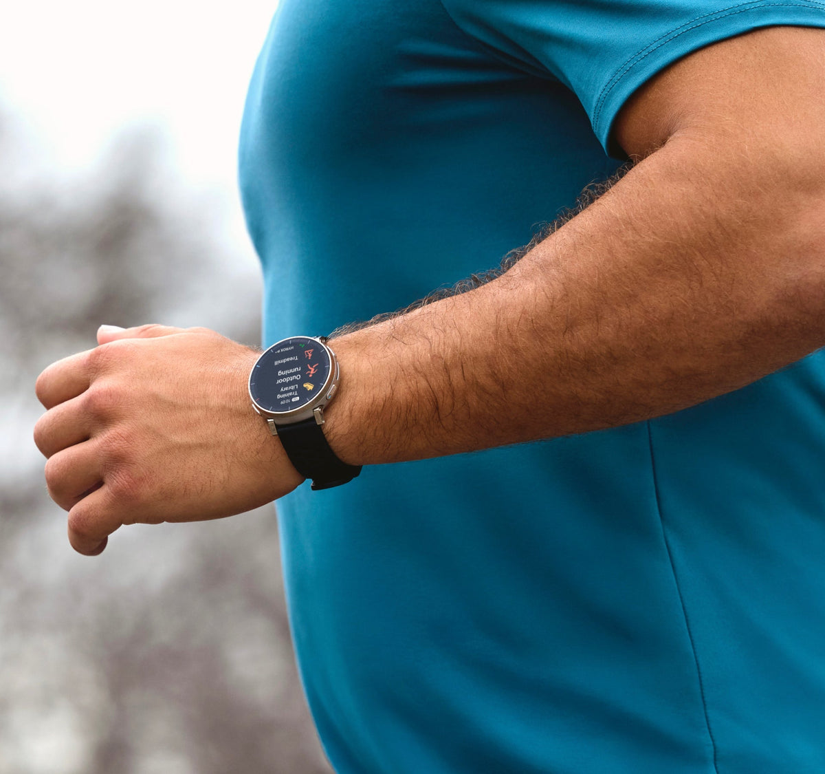 Amazfit Active 3 Premium 45mm Smartwatch - Apex Silver - checking the display on a run
