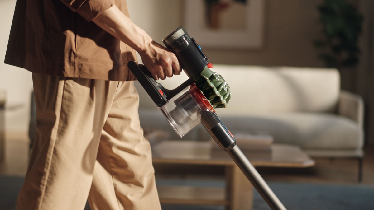 Dyson V8 Cyclone Cordless Vacuum Cleaner - cleaning a living room