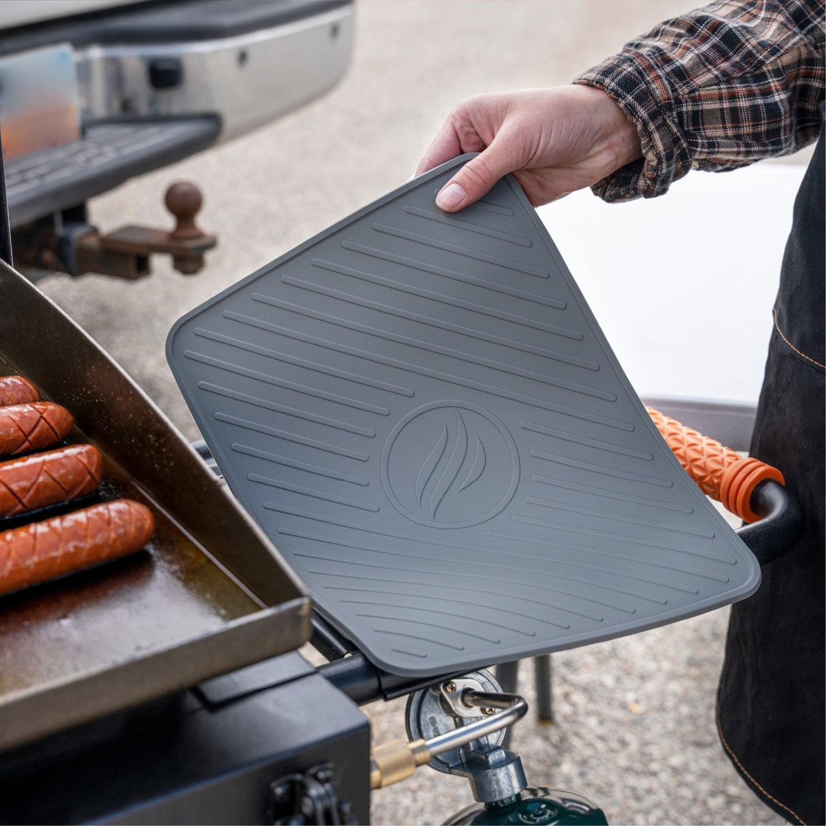 Blackstone Large Silicone Griddle Tool Mat - Grey - lifting the mat