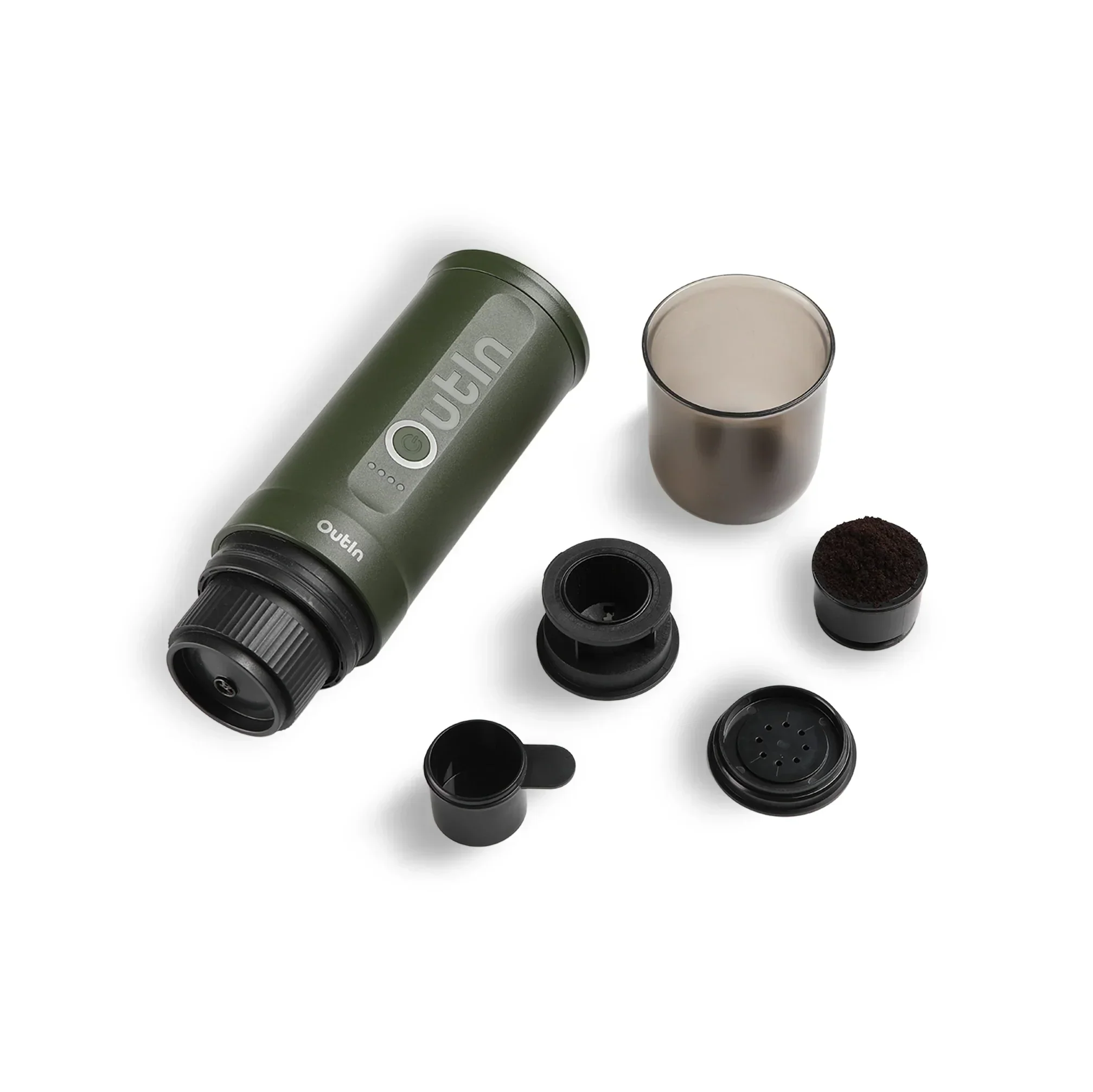 Outin Nano portable espresso machine in Forest Green with ground coffee, coffee capsules and a glass of espresso