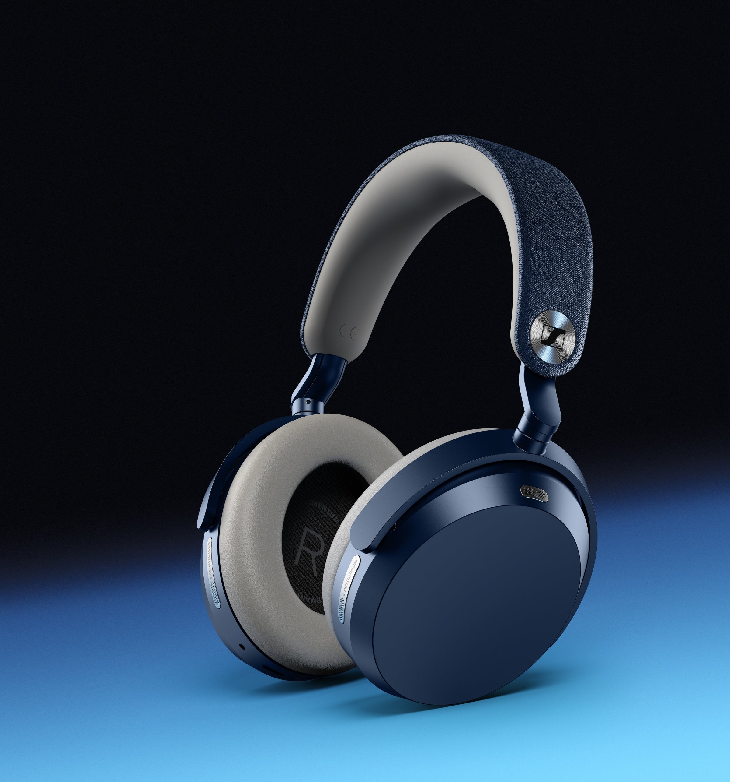 Sennheiser MOMENTUM 5 Wireless Headphones Denim — dramatic angle on blue gradient